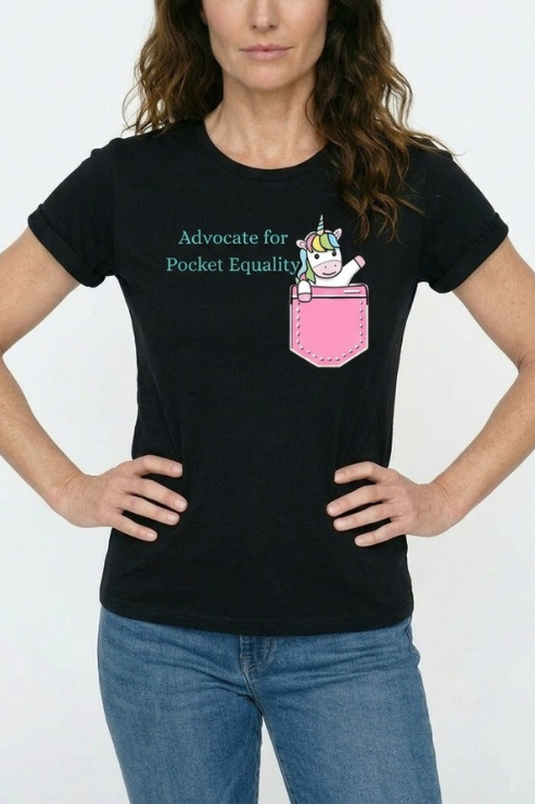Person wearing a black t-shirt with a unicorn graphic and text on a white background