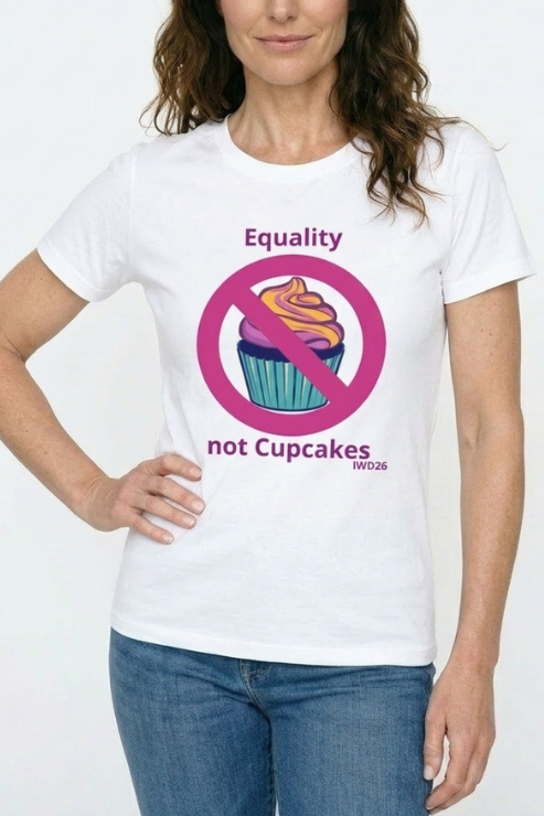 Person wearing a white t-shirt with a political message graphic and text.