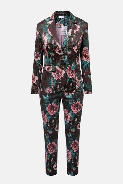A women's two-piece suit featuring a dark brown base with a vibrant pink and green floral print, shown on a light gray background.